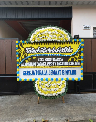 Papan Bunga Duka di Polohungo
